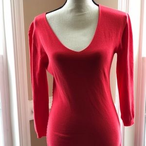 Rich Orange Sweater with sexy cut outs